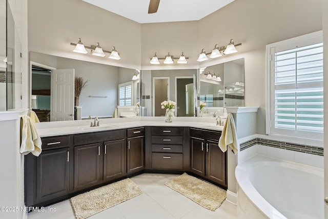 117 Pineta Way, Saint Johns, FL 32259 - bathroom featuring double vanity, a garden tub, tile patterned floors, and ceiling fan