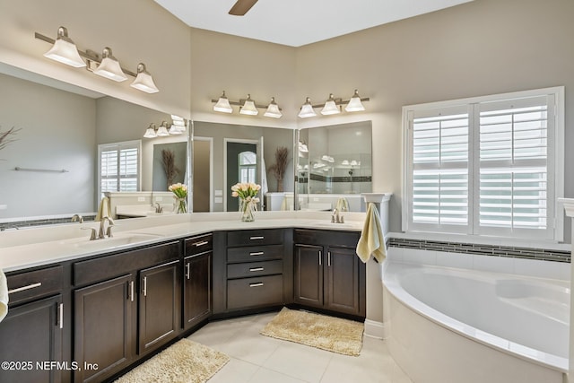 117 Pineta Way, Saint Johns, FL 32259 - full bath featuring a bath, double vanity, tile patterned flooring, a tile shower, and ceiling fan