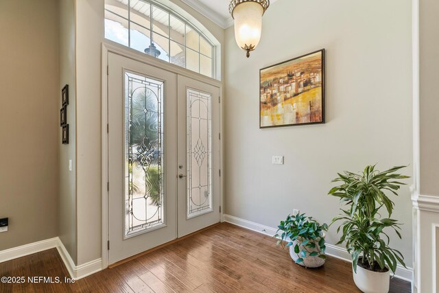 117 Pineta Way, Saint Johns, FL 32259 - foyer entrance featuring baseboards, wood finished floors, and ornamental molding