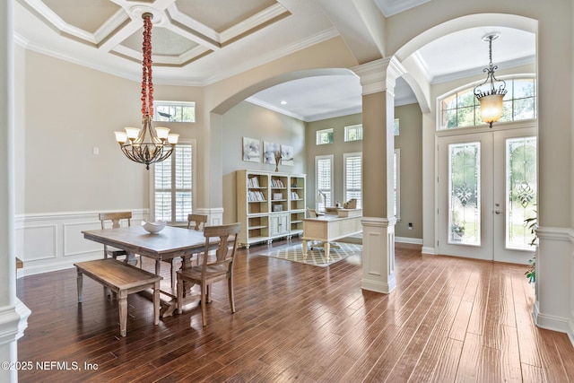 117 Pineta Way, Saint Johns, FL 32259 - dining room featuring arched walkways, crown molding, a chandelier, hardwood / wood-style flooring, and coffered ceiling