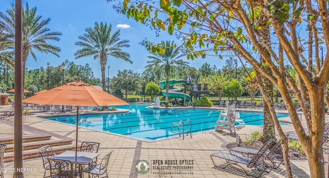 117 Pineta Way, Saint Johns, FL 32259 - community pool featuring a water slide and a patio