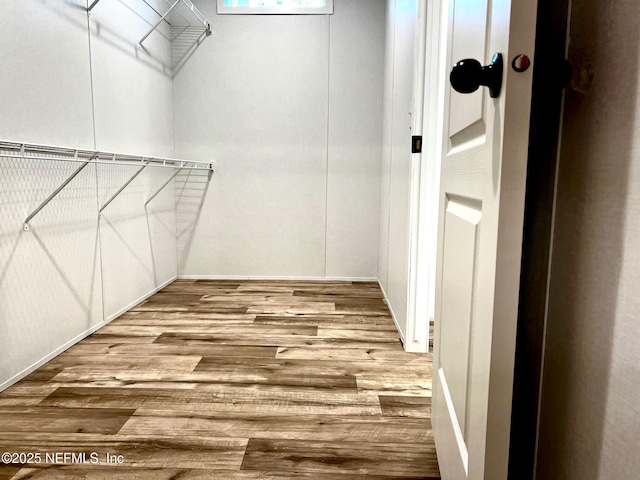 11648 E Confederate Dr, Glen St Mary, FL 32040 - spacious closet with wood finished floors