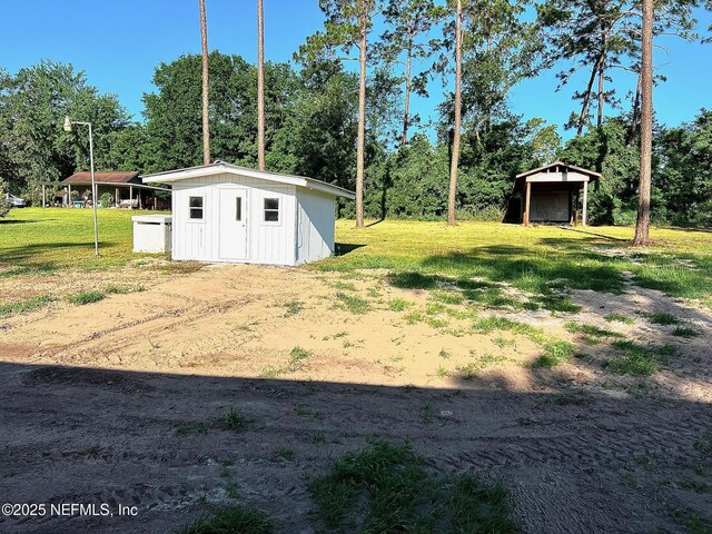 11648 E Confederate Dr, Glen St Mary, FL 32040 - view of grassy yard with view of scattered trees