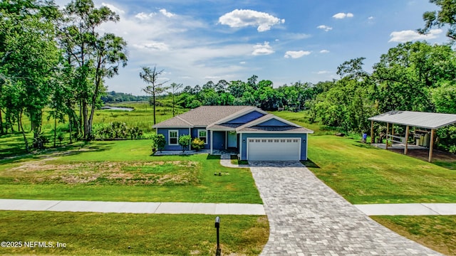 9706 Sibbald Rd, Jacksonville, FL 32219 - view of front of home featuring an attached garage, a front lawn, decorative driveway, and view of wooded area