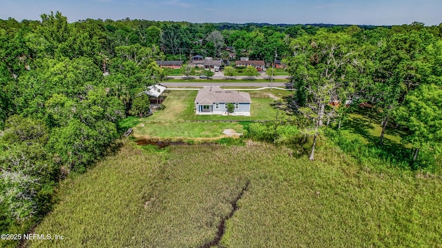 9706 Sibbald Rd, Jacksonville, FL 32219 - view of subject property with a forest
