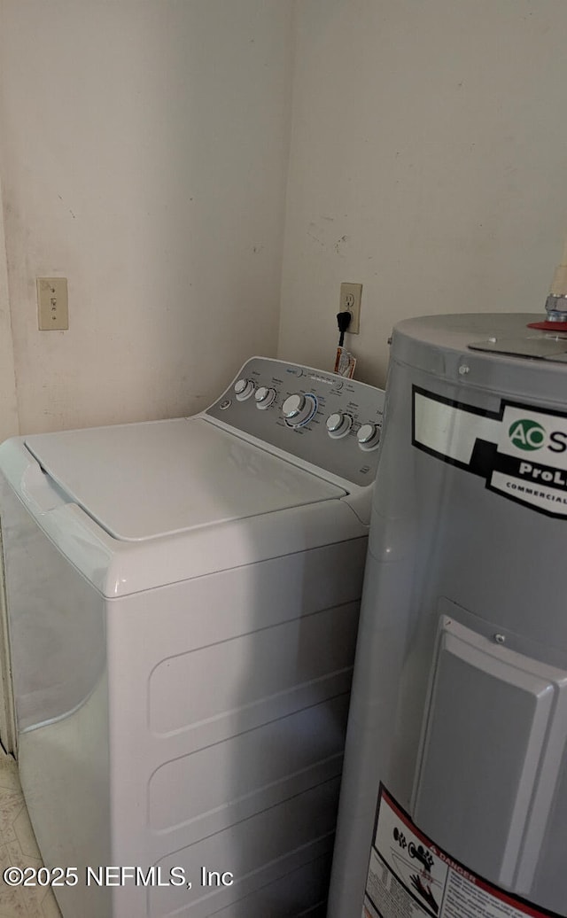 4649 Fairleigh Ave, Jacksonville, FL 32208 - laundry room with electric water heater and washer and dryer