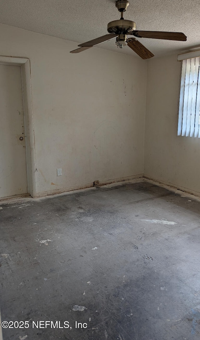4649 Fairleigh Ave, Jacksonville, FL 32208 - spare room featuring ceiling fan and a textured ceiling