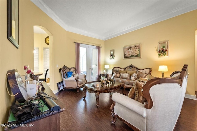 9955 Kings Crossing Dr E, Jacksonville, FL 32219 - living area featuring ornamental molding, arched walkways, dark wood-style flooring, french doors, and baseboards