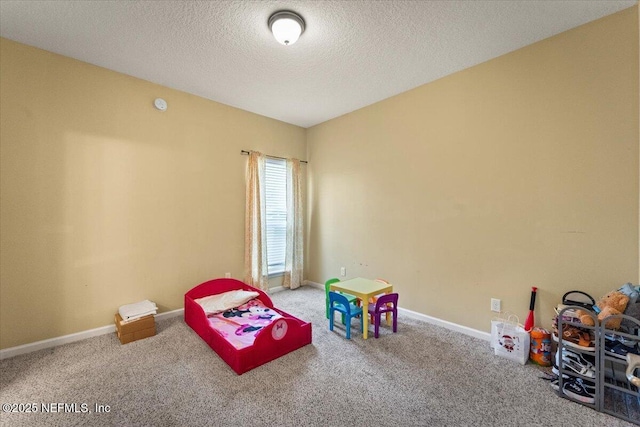 9955 Kings Crossing Dr E, Jacksonville, FL 32219 - playroom featuring carpet, a textured ceiling, and baseboards