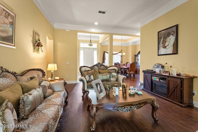 9955 Kings Crossing Dr E, Jacksonville, FL 32219 - living area with crown molding, wood finished floors, baseboards, a chandelier, and recessed lighting