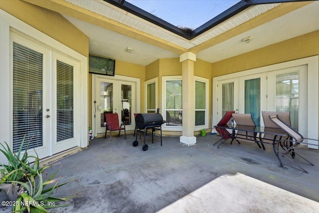 9955 Kings Crossing Dr E, Jacksonville, FL 32219 - view of patio with french doors
