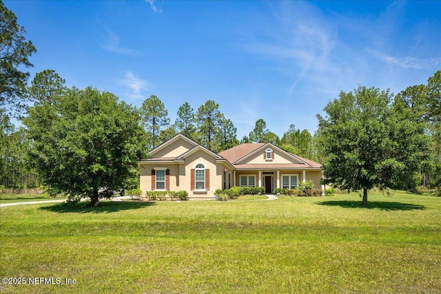 9955 Kings Crossing Dr E, Jacksonville, FL 32219 - ranch-style house with a front yard