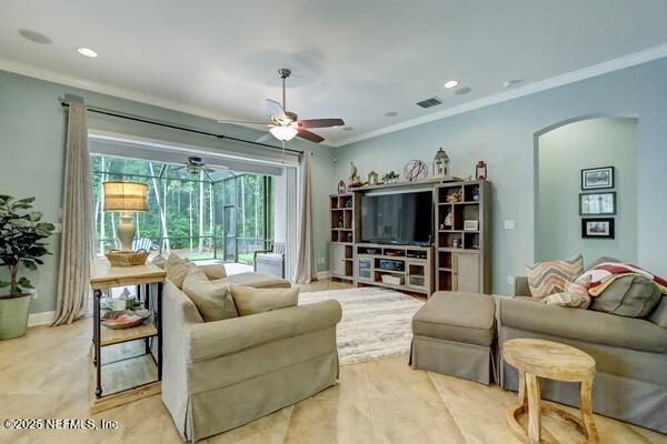 167 Royal Lake Dr, Ponte Vedra, FL 32081 - living room featuring ornamental molding, a ceiling fan, arched walkways, and recessed lighting