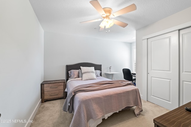 622 2nd Ave N, Jacksonville Beach, FL 32250 - bedroom featuring light colored carpet, a ceiling fan, an office area, and a textured ceiling