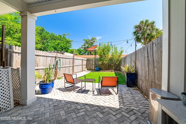 622 2nd Ave N, Jacksonville Beach, FL 32250 - fenced backyard featuring a patio