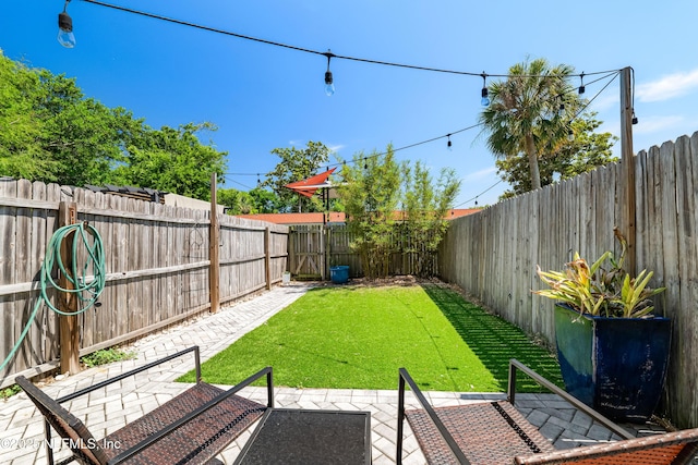 622 2nd Ave N, Jacksonville Beach, FL 32250 - view of yard featuring a patio