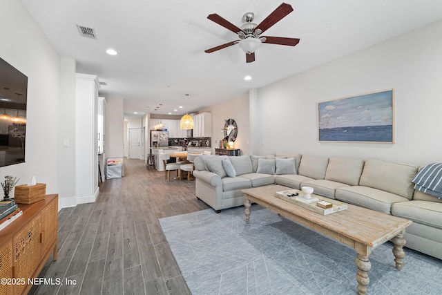 622 2nd Ave N, Jacksonville Beach, FL 32250 - living area featuring a ceiling fan, dark wood-style floors, recessed lighting, and baseboards