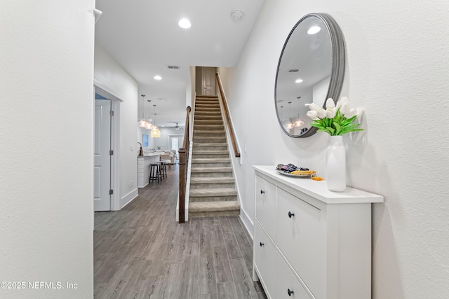 622 2nd Ave N, Jacksonville Beach, FL 32250 - staircase with recessed lighting, baseboards, and wood finished floors