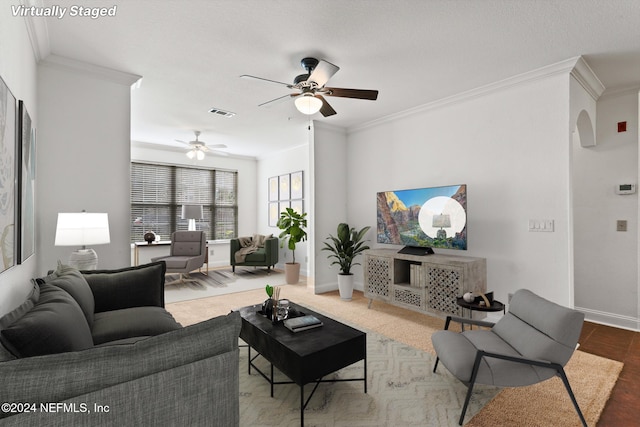 13810 Sutton Park Dr N Unit 511, Jacksonville, FL 32224 - living area with ornamental molding, ceiling fan, and baseboards