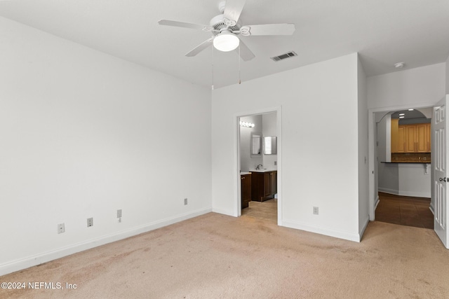 13810 Sutton Park Dr N Unit 511, Jacksonville, FL 32224 - unfurnished bedroom with light colored carpet, baseboards, and ensuite bath