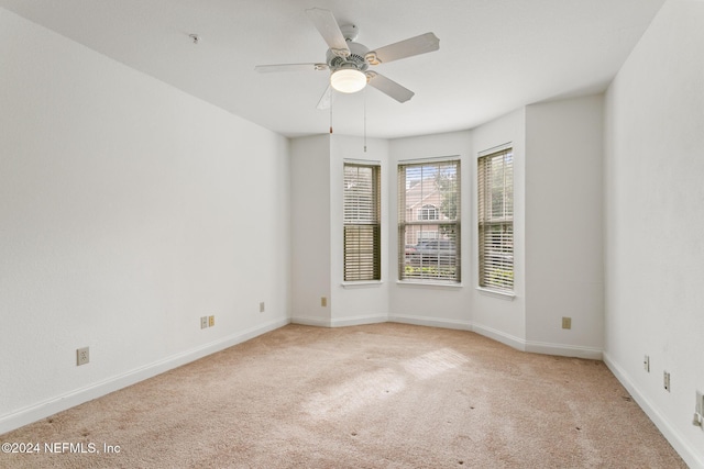 13810 Sutton Park Dr N Unit 511, Jacksonville, FL 32224 - empty room with carpet flooring, baseboards, and ceiling fan
