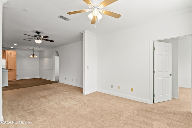 13810 Sutton Park Dr N Unit 511, Jacksonville, FL 32224 - unfurnished living room with a ceiling fan, light carpet, ornamental molding, arched walkways, and baseboards
