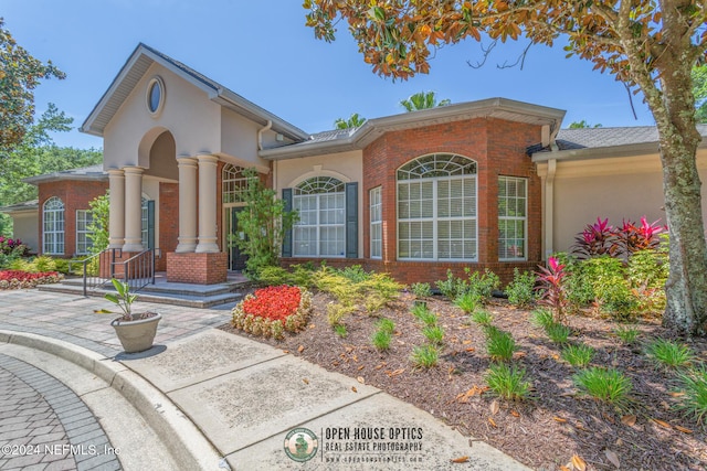 13810 Sutton Park Dr N Unit 511, Jacksonville, FL 32224 - view of front of property featuring brick siding and stucco siding