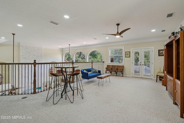 2579 Woodgrove Rd, Fleming Island, FL 32003 - sitting room with ceiling fan, carpet, recessed lighting, french doors, and crown molding