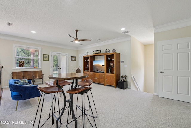 2579 Woodgrove Rd, Fleming Island, FL 32003 - carpeted dining room featuring ornamental molding, recessed lighting, a textured ceiling, and ceiling fan