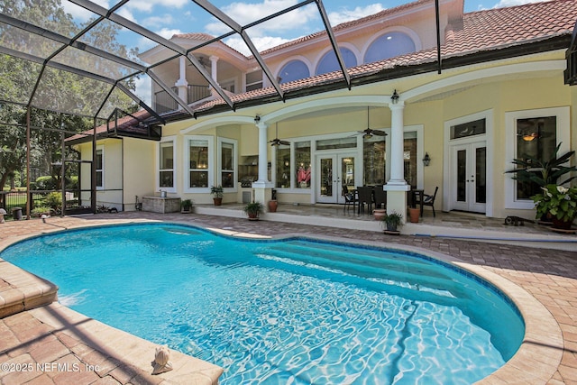 2579 Woodgrove Rd, Fleming Island, FL 32003 - outdoor pool featuring french doors, a ceiling fan, a patio, and a lanai