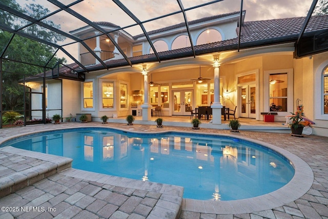 2579 Woodgrove Rd, Fleming Island, FL 32003 - swimming pool featuring french doors, a patio, ceiling fan, and a lanai