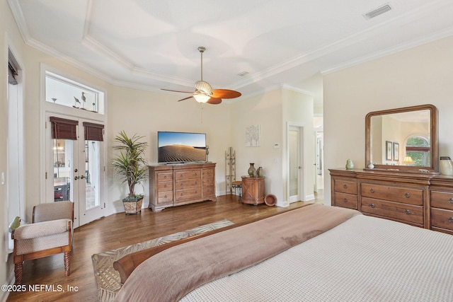2579 Woodgrove Rd, Fleming Island, FL 32003 - bedroom featuring wood finished floors, ornamental molding, and french doors