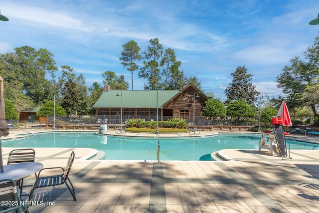 2579 Woodgrove Rd, Fleming Island, FL 32003 - community pool with a patio