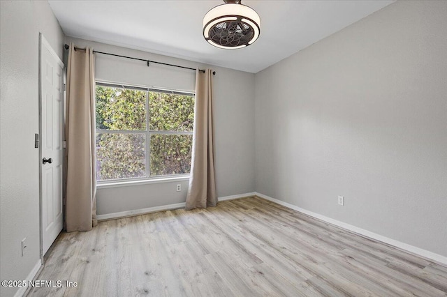1800 The Greens Way Unit 406, Jacksonville Beach, FL 32250 - spare room featuring wood finished floors