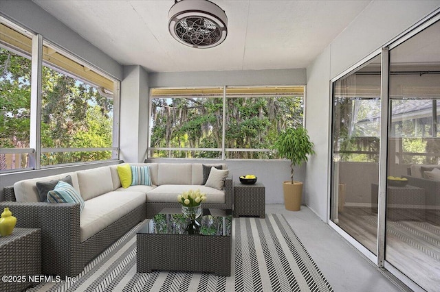 1800 The Greens Way Unit 406, Jacksonville Beach, FL 32250 - sunroom / solarium featuring healthy amount of natural light and outdoor lounge area