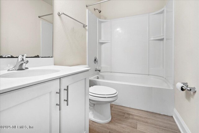 2629 Cold Stream Ln, Green Cove Springs, FL 32043 - bathroom featuring wood finished floors, bathing tub / shower combination, and vanity