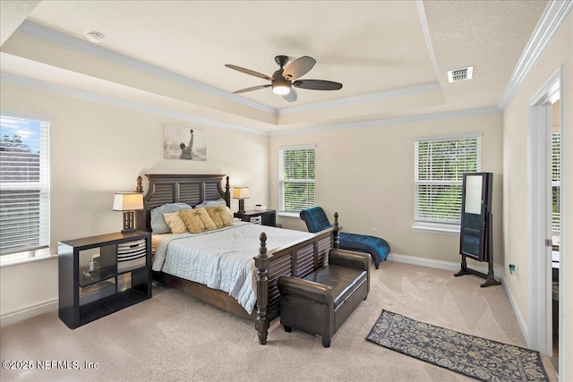2629 Cold Stream Ln, Green Cove Springs, FL 32043 - bedroom featuring a tray ceiling, crown molding, carpet flooring, and a ceiling fan
