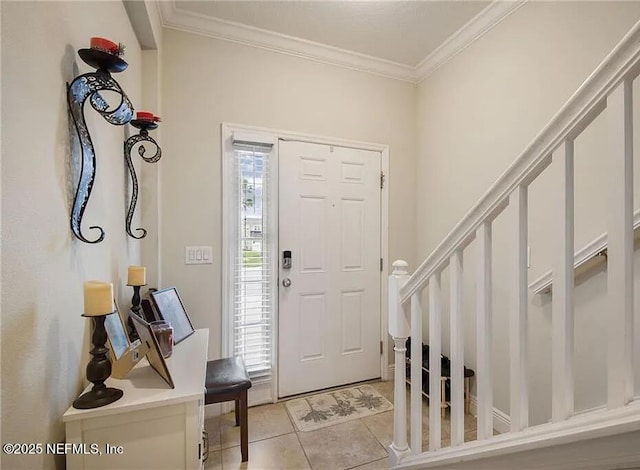 4063 70th Ter N, Pinellas Park, FL 33781 - foyer entrance with ornamental molding, light tile patterned floors, and stairway
