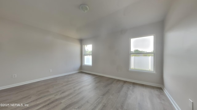4053 Trail Ridge Rd, Middleburg, FL 32068 - empty room with baseboards and wood finished floors
