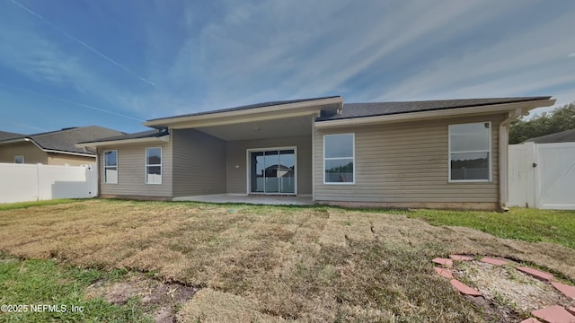 4053 Trail Ridge Rd, Middleburg, FL 32068 - rear view of property with a patio area