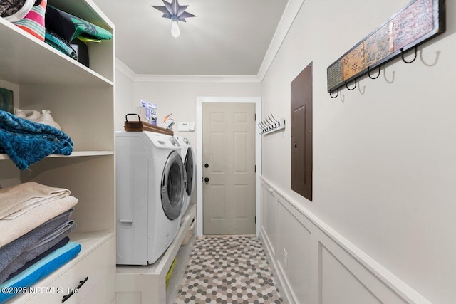 1759 Rising Oaks Dr, Jacksonville, FL 32223 - laundry area with washing machine and clothes dryer, light floors, electric panel, and ornamental molding