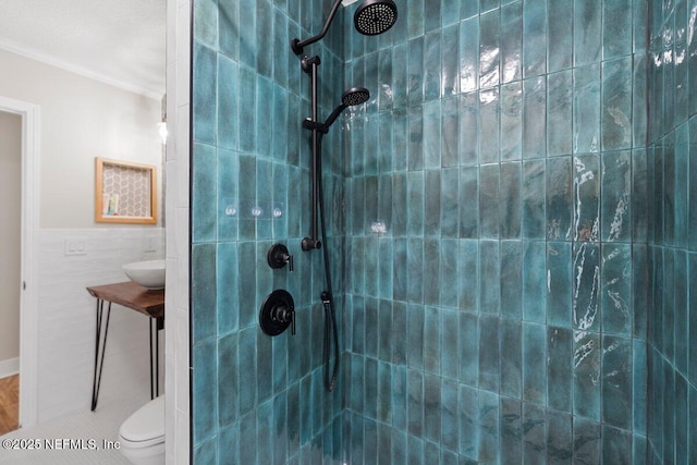 1759 Rising Oaks Dr, Jacksonville, FL 32223 - full bath with crown molding, a tile shower, toilet, and tile walls