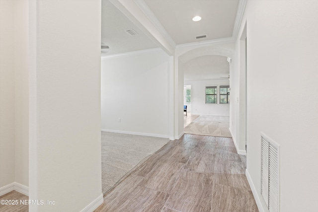 109 Sweet Pine Trl, Ponte Vedra, FL 32081 - corridor with ornamental molding, arched walkways, wood finished floors, and baseboards