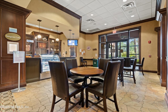 109 Sweet Pine Trl, Ponte Vedra, FL 32081 - dining room with ornamental molding, a paneled ceiling, light stone finish flooring, and baseboards