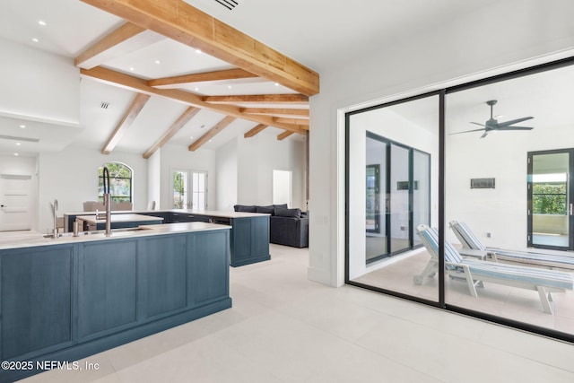 95544 Wilder Blvd, Fernandina Beach, FL 32034 - kitchen with open floor plan, blue cabinets, plenty of natural light, and recessed lighting