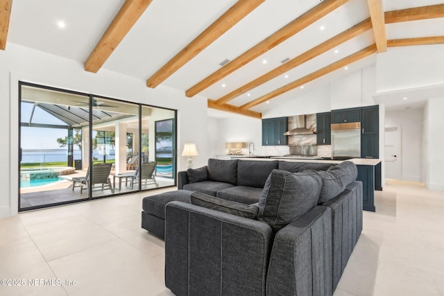 95544 Wilder Blvd, Fernandina Beach, FL 32034 - living room with high vaulted ceiling, beam ceiling, light tile patterned flooring, recessed lighting, and a sunroom