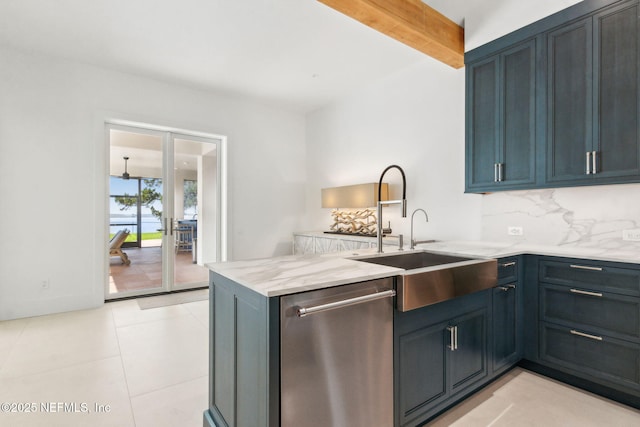 95544 Wilder Blvd, Fernandina Beach, FL 32034 - kitchen with dishwasher, a sink, a peninsula, light stone counters, and backsplash