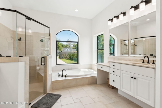 95544 Wilder Blvd, Fernandina Beach, FL 32034 - full bath featuring vanity, a garden tub, a shower stall, and recessed lighting