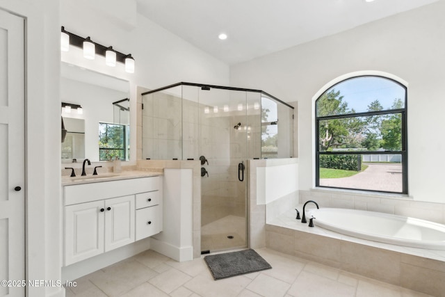 95544 Wilder Blvd, Fernandina Beach, FL 32034 - bathroom featuring vanity, a garden tub, plenty of natural light, a shower stall, and recessed lighting
