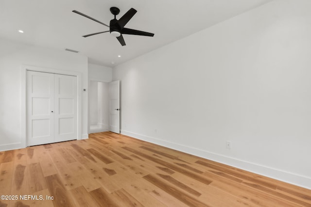 95544 Wilder Blvd, Fernandina Beach, FL 32034 - unfurnished bedroom featuring baseboards, light wood-type flooring, a closet, recessed lighting, and ceiling fan